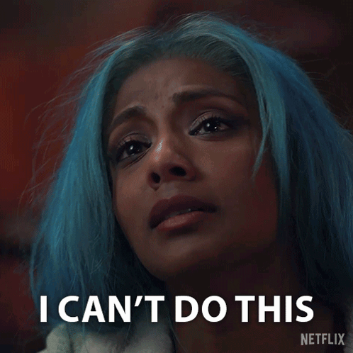 A Woman With Blue Hair Is Crying With The Words " Without You " Behind Her GIF