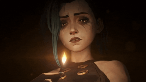 A Woman With Blue Hair Is Holding A Lit Candle In Her Hand GIF