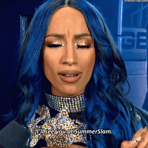 A Woman With Blue Hair Is Talking Into A Microphone And Says " I 'Ll See You At Summerslam " GIF