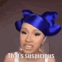 A Woman With Blue Hair Is Wearing A Blue Wig And Says `` That 'S Suspicious '' . GIF