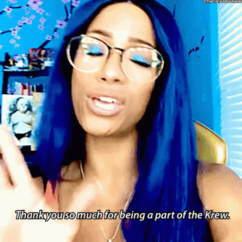 A Woman With Blue Hair Is Wearing Glasses And Says " Thank You So Much For Being A Part Of The Krew " GIF