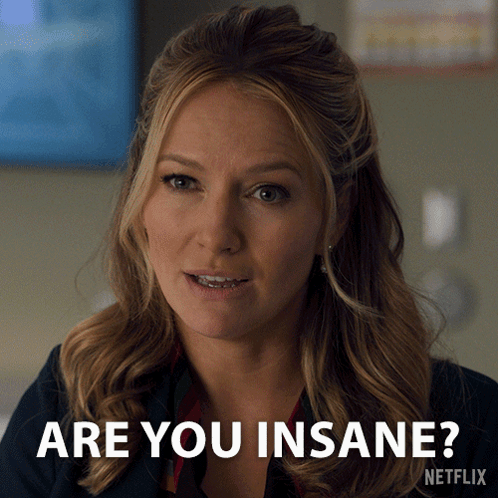 A Woman With Braces On Her Teeth Is Asking If She Is Insane GIF