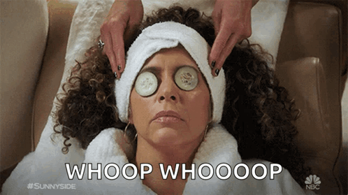 A Woman With Cucumber Slices On Her Eyes Is Laying On A Couch With The Caption Whoop Whooop GIF