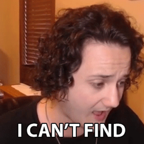 A Woman With Curly Hair Is Making A Funny Face With The Words `` I Can 'T Find '' Written On Her Face . GIF