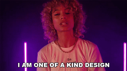 A Woman With Curly Hair Is Saying I Am One Of A Kind Design . GIF