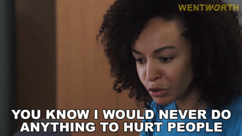 A Woman With Curly Hair Is Saying " You Know I Would Never Do Anything To Hurt People " GIF