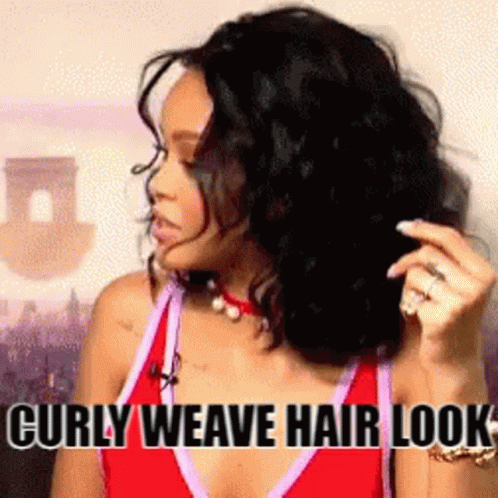 A Woman With Curly Hair Is Wearing A Red Tank Top And A Necklace . GIF
