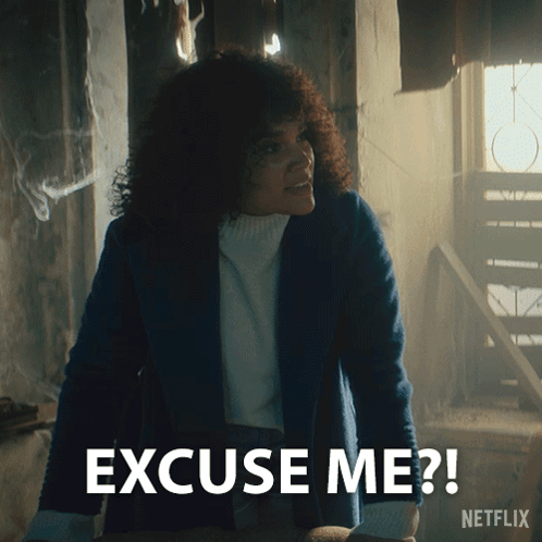 A Woman With Curly Hair Says Excuse Me On A Netflix Ad GIF
