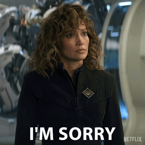 Woman With Curly Hair Saying Im Sorry In Netflix Ad GIF