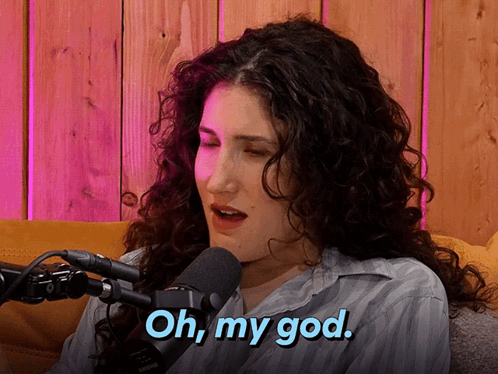 A Woman With Curly Hair Says Oh My God GIF