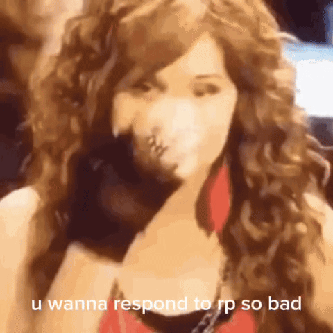 A Woman With Curly Hair Says " U Wanna Respond To Rp So Bad " In A Video GIF