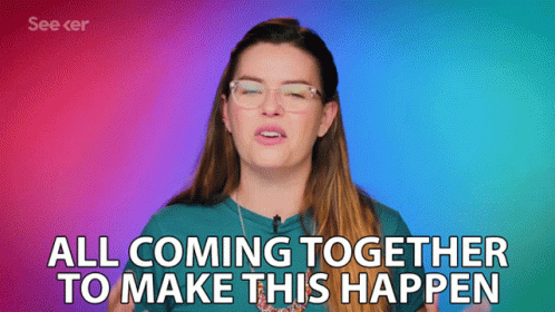 A Woman With Glasses And A Blue Shirt Says All Coming Together To Make This Happen GIF