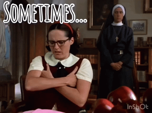 A Woman With Glasses Is Sitting In Front Of A Nun And The Words Sometimes Are Above Her GIF