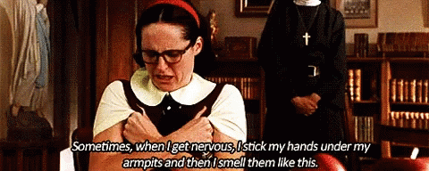 A Woman With Glasses Says Sometimes When I Get Nervous I Stick My Hands Under My Armpits GIF