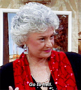A Woman With Gray Hair And A Red Scarf Says " Go To Hell " GIF