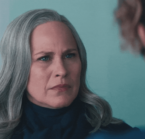A Woman With Gray Hair And The Words You Are Fired Below Her GIF