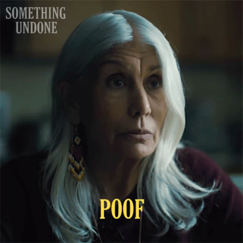 A Woman With Gray Hair Has The Word Poof Above Her Head GIF