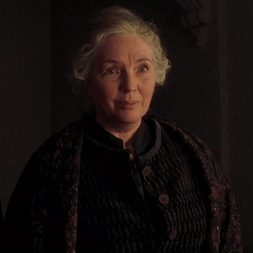A Woman With Gray Hair Is Smiling And Says How Do You Do Children GIF