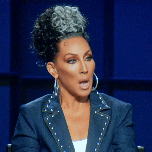 Woman With Gray Hair Wearing Blue Jacket GIF