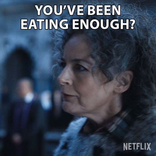 A Woman With Gray Hair Says " You 'Ve Been Eating Enough " In A Netflix Advertisement GIF