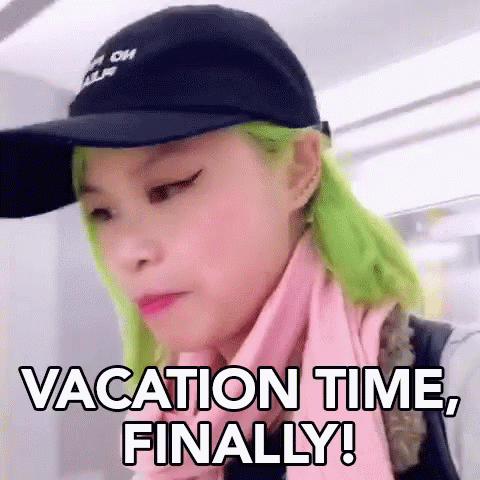 A Woman With Green Hair Is Wearing A Hat And A Scarf And Says `` Vacation Time , Finally ! '' GIF