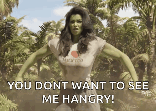 A Woman With Green Hair Is Wearing A Mexico Shirt GIF