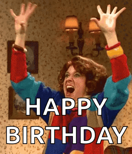 A Woman With Her Arms In The Air And The Words Happy Birthday Above Her GIF