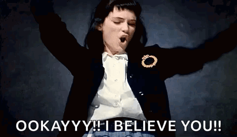 A Woman With Her Arms In The Air And The Words `` I Believe You '' Written Below Her . GIF
