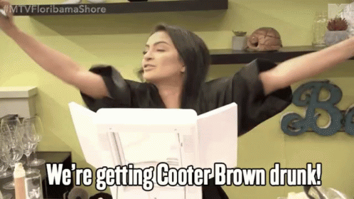 A Woman With Her Arms Outstretched Says " We 'Re Getting Cooter Brown Drunk ! " GIF