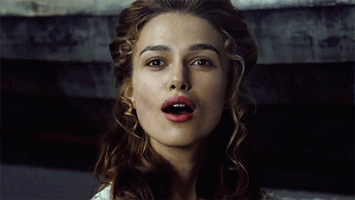 A Woman With Her Eyes Closed And Her Mouth Open GIF