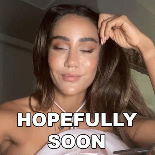 A Woman With Her Eyes Closed And The Words Hopefully Soon Written On Her Face GIF