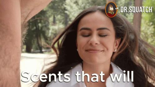 A Woman With Her Eyes Closed And The Words Scents That Will GIF
