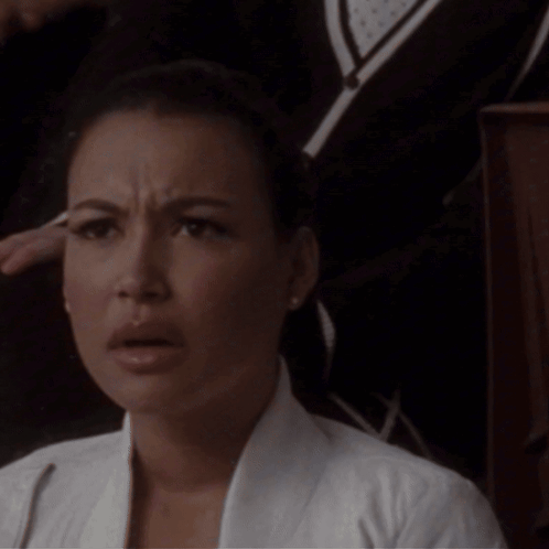 A Woman With Her Eyes Closed Has A Cotton Swab On Her Eyebrow GIF