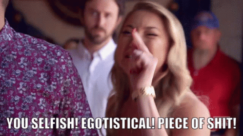 A Woman With Her Finger In Her Nose Says You Selfish Egotistical Piece Of Shit . GIF