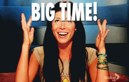 A Woman With Her Hands In The Air And The Words Big Time Above Her GIF