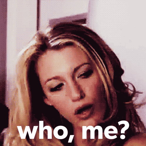 A Woman With Her Mouth Open And The Words Who Me Behind Her GIF