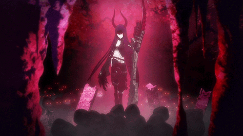 A Woman With Horns Holding A Sword In A Dark Cave GIF