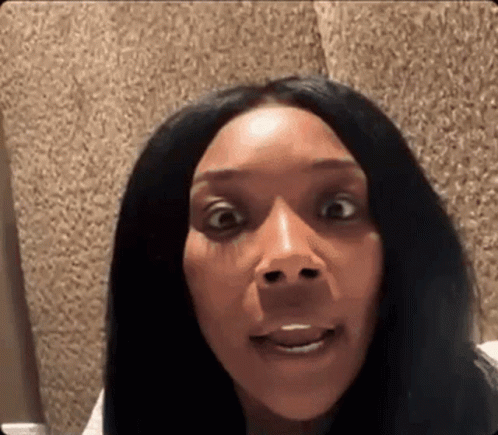 Woman With Long Black Hair Surprised GIF