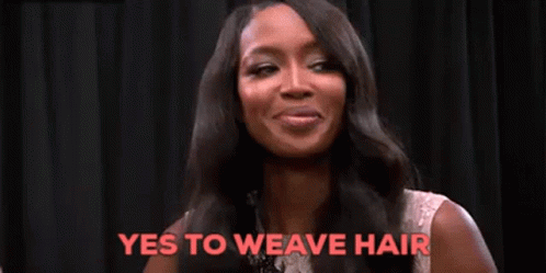 A Woman With Long Black Hair Is Smiling And Saying Yes To Weave Hair . GIF