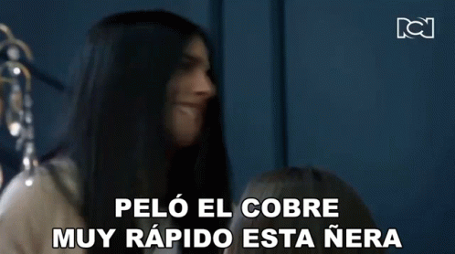 A Woman With Long Black Hair Is Talking In Spanish GIF