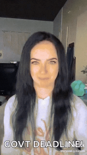 A Woman With Long Black Hair Says Govt Deadline On Her Face GIF