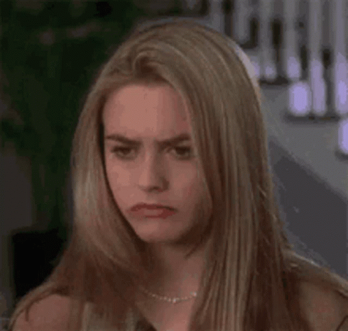 Woman With Long Blonde Hair Making Funny Face GIF