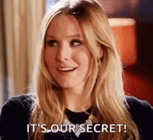 A Woman With Long Blonde Hair Is Smiling And Saying `` It 'S Our Secret ! '' GIF