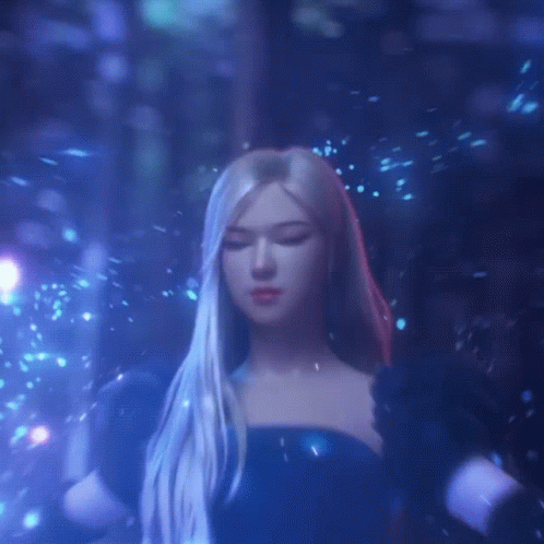 a woman with long blonde hair is standing in a dark room with a blue background .