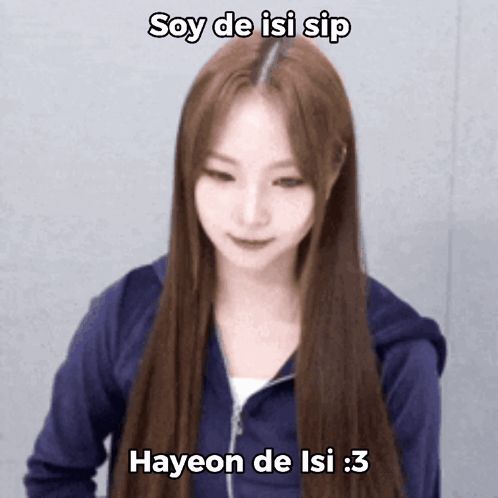 A Woman With Long Brown Hair Is Wearing A Blue Jacket And Says Soy De Isi Sip GIF