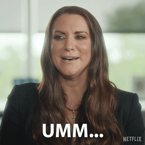 A Woman With Long Brown Hair Says Umm In A Netflix Ad GIF