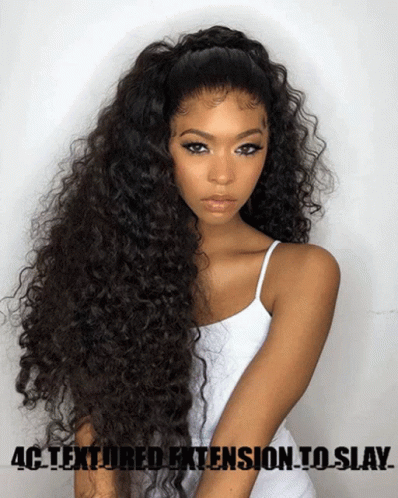 A Woman With Long Curly Hair And The Words 4C Textured Extension To Slay On The Bottom GIF