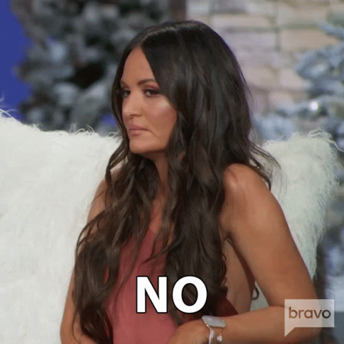 A Woman With Long Hair And A Bravo Logo Behind Her GIF