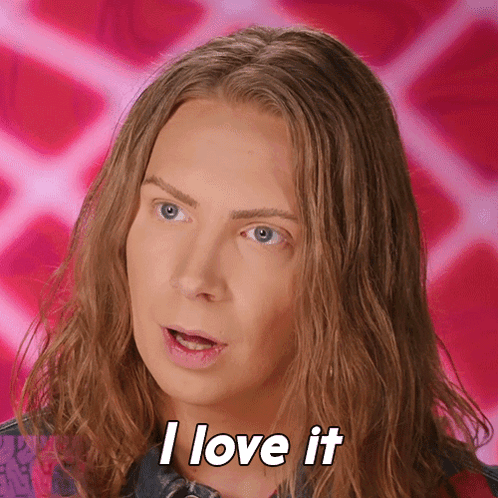 A Woman With Long Hair Is Saying I Love It GIF