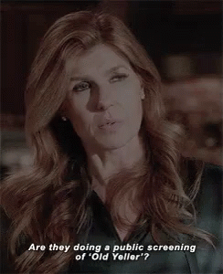 A Woman With Long Red Hair Is Asking If They Are Doing A Public Screening Of ' Old Yeller ' . GIF